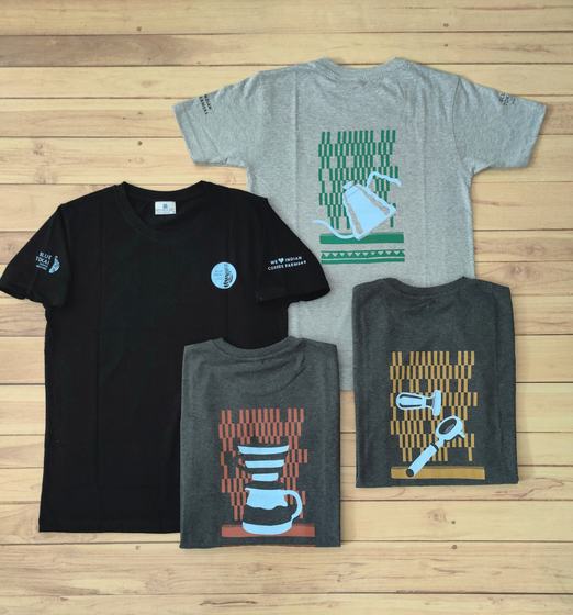 Black and grey round-neck t-shirts with green, blue and orange coffee equipment graphic prints, custom made by RestroCart, New Delhi