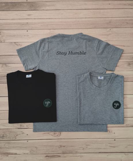 Grey round-neck t-shirt printed Stay Humble on the back with black and grey tees bearing round logo, custom made by RestroCart, New Delhi