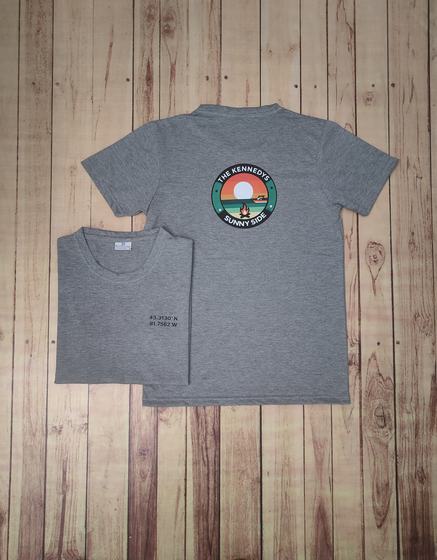 Grey round-neck t-shirts with circular sunset badge print on the back and small text on chest, custom made by RestroCart, New Delhi