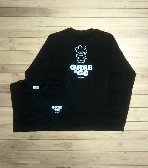 Black long-sleeve t-shirts with white printed cartoon mascot and logo on back and chest, flat lay, custom made by RestroCart, New Delhi