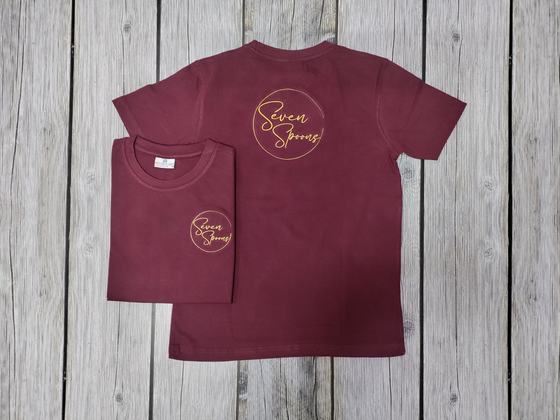 Maroon round neck t-shirts with gold printed circular script logo, front and back view, custom made by RestroCart, New Delhi