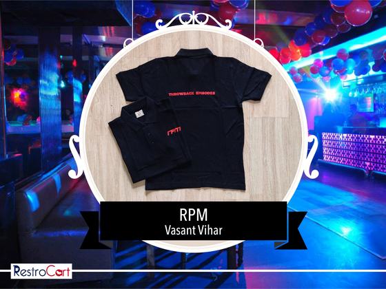 Two black polo t-shirts with small red printed text on the chest, one folded, custom made for RPM Club by RestroCart, New Delhi