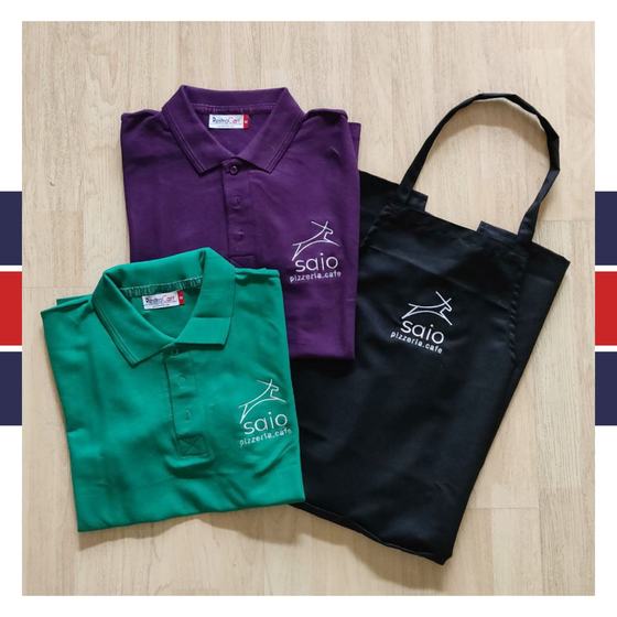 Purple and green polo T-shirts with black bib apron, all with white embroidered deer logo, custom made for Saio Pizzeria by RestroCart, New Delhi