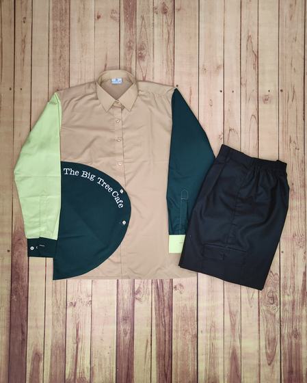 Colour-block service shirt in beige, lime and bottle green with curved printed name, with navy shorts, custom made by RestroCart, New Delhi