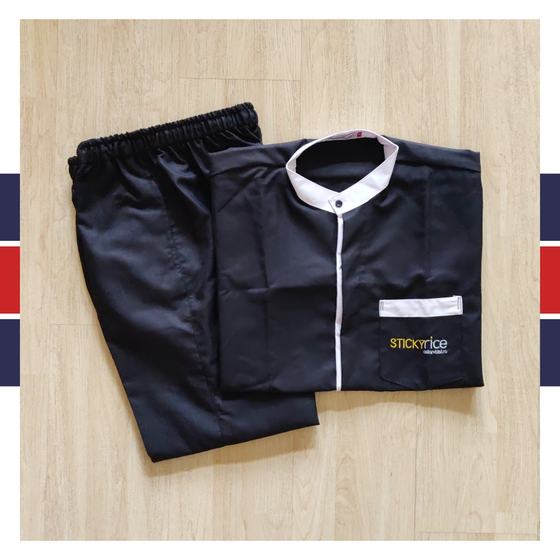 Black housekeeping tunic with white collar, placket and pocket trim plus black trousers, custom made for Sticky Rice by RestroCart, New Delhi