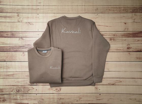 Taupe fleece sweatshirts with white script embroidered name on the chest, one folded and one flat, custom made by RestroCart, New Delhi