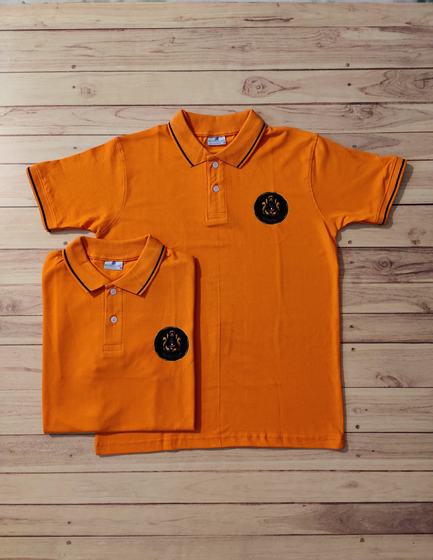 Orange polo t-shirts with black tipped collar and round black chest logo, folded pair, custom made for Swing Tales by RestroCart, New Delhi