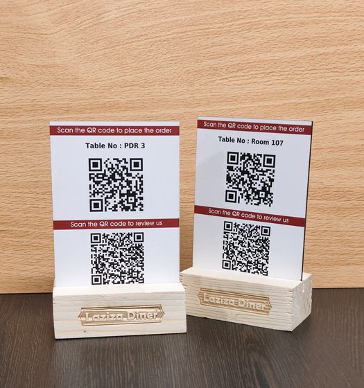 White QR code table stands with red header strips set in pine wood blocks with engraved name, custom made by RestroCart, New Delhi