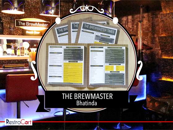 Newspaper style printed menus with yellow highlighted sections, spread on a table, custom made for The Brewmaster by RestroCart, New Delhi