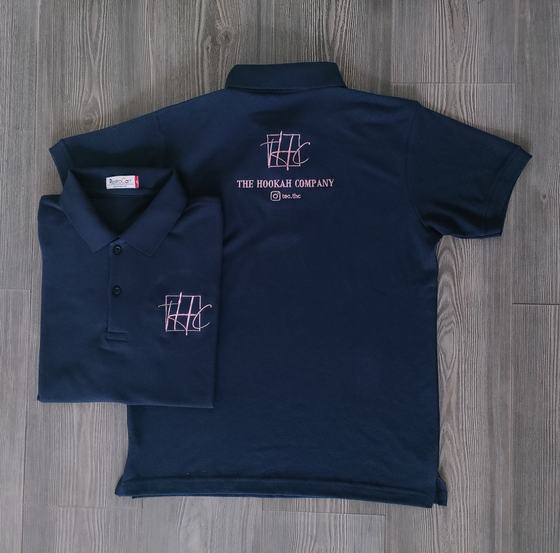 Navy polo t-shirts with white embroidered monogram logo on back and chest, custom made for The Hookah Company by RestroCart, New Delhi