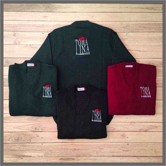 Green, black and maroon V-neck knit sweaters with white and red embroidered logo, four laid flat, custom made for Tomatina by RestroCart, New Delhi