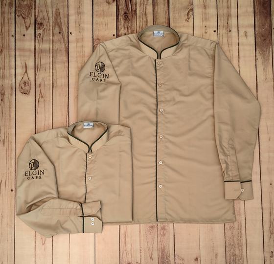 Beige band-collar uniform shirts with black collar piping and black sleeve logo, long and short sleeve, custom made by RestroCart, New Delhi