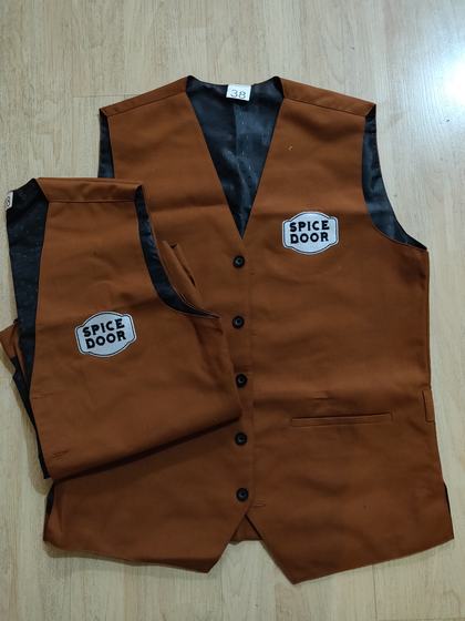 Rust brown waistcoats with black lining and white printed badge logo, folded pair, custom made by RestroCart, New Delhi