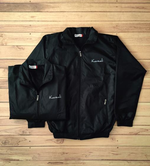 Black zip-up windcheater jackets with stand collar and white embroidered script name, custom made by RestroCart, New Delhi