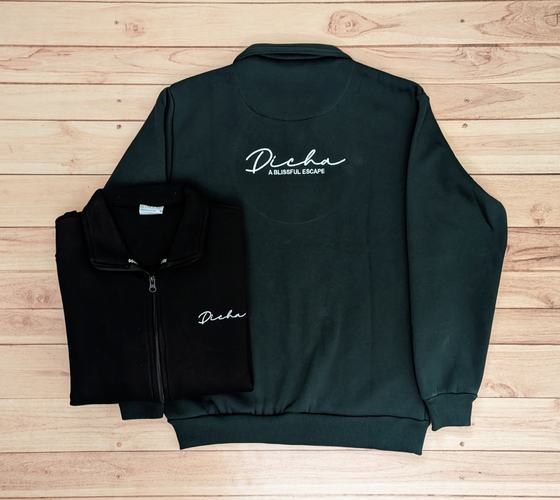 Bottle green zip jacket with white script back print and folded black jacket with chest logo, custom made by RestroCart, New Delhi