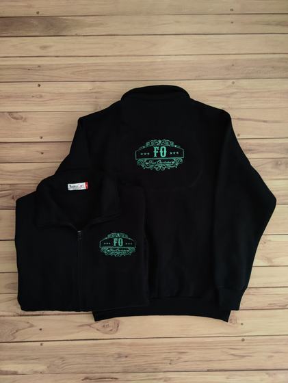 Black fleece zip jackets with green embroidered ornamental logo on chest and back, custom made for Food Overloaded by RestroCart, New Delhi