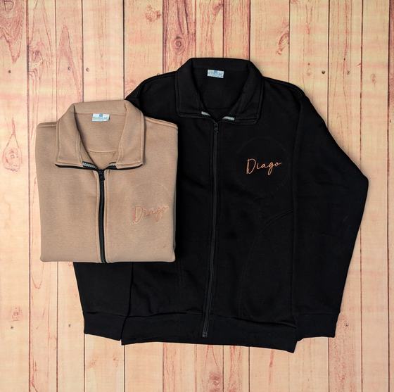 Black and beige full-zip fleece jackets with copper embroidered script name on chest, custom made by RestroCart, New Delhi