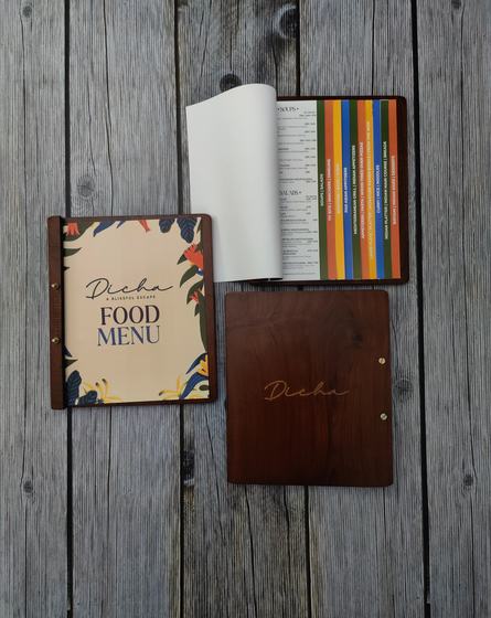 Wooden menu board with printed floral food menu cover, colourful tabbed pages and engraved back, custom made by RestroCart, New Delhi