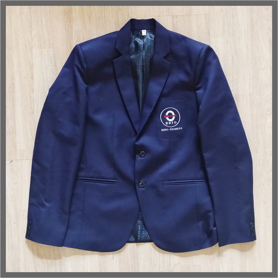 Navy two button blazer with patterned lining and embroidered round logo on chest pocket, custom made for Xero Degrees by RestroCart, New Delhi