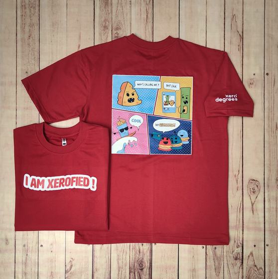 Red oversized t-shirts with comic strip back print and bold slogan on folded front, custom made for Xero Degrees by RestroCart, New Delhi